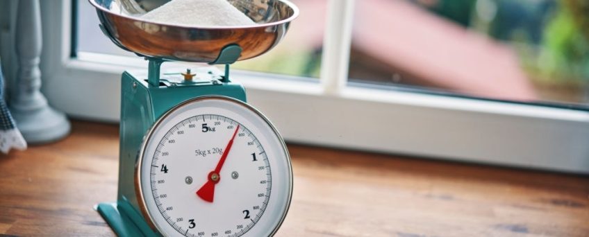 Weighing Flour on a Scale