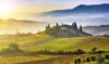 Tuscany foggy landscape at sunrise Italy